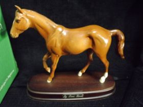 GB Royal Doulton chestnut colour ceramic Horse on a wooden stand. Model DA193 'My First Horse'.