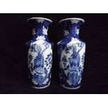 A Pair of Chinese Blue and White Lotus and Apple Blossom Vases. Decorated with Lotus Throne in