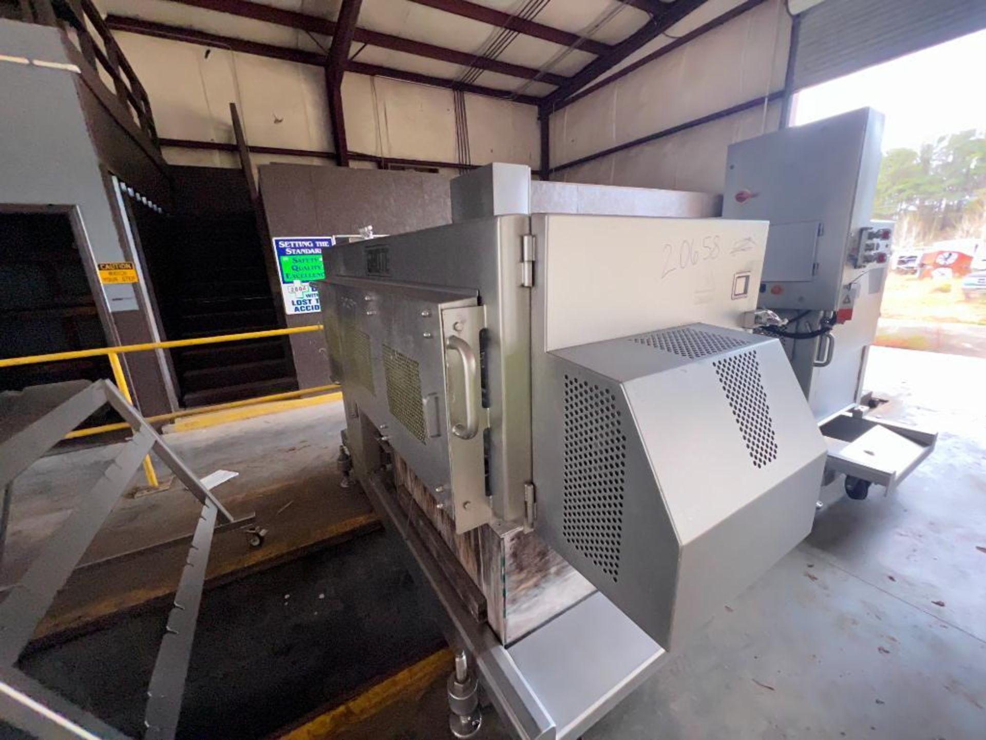 2015 Grote slicer, model: 640E, with (2) stainless steel wash carts