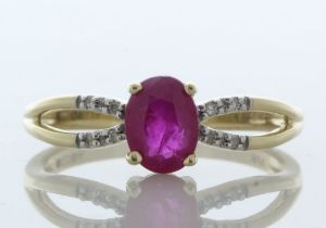 9ct Yellow Gold Diamond And Ruby Ring (R0.81) 0.03 Carats - Valued By IDI £2,505.00 - An oval 8mm