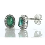14ct White Gold Oval Cut Emerald And Diamond Stud Earring 0.10 Carats - Valued By IDI £2,225.00 -