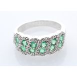 Silver Emerald Ring - Valued By AGI £290.00 - Sterling silver emerald ring , set with twelve round