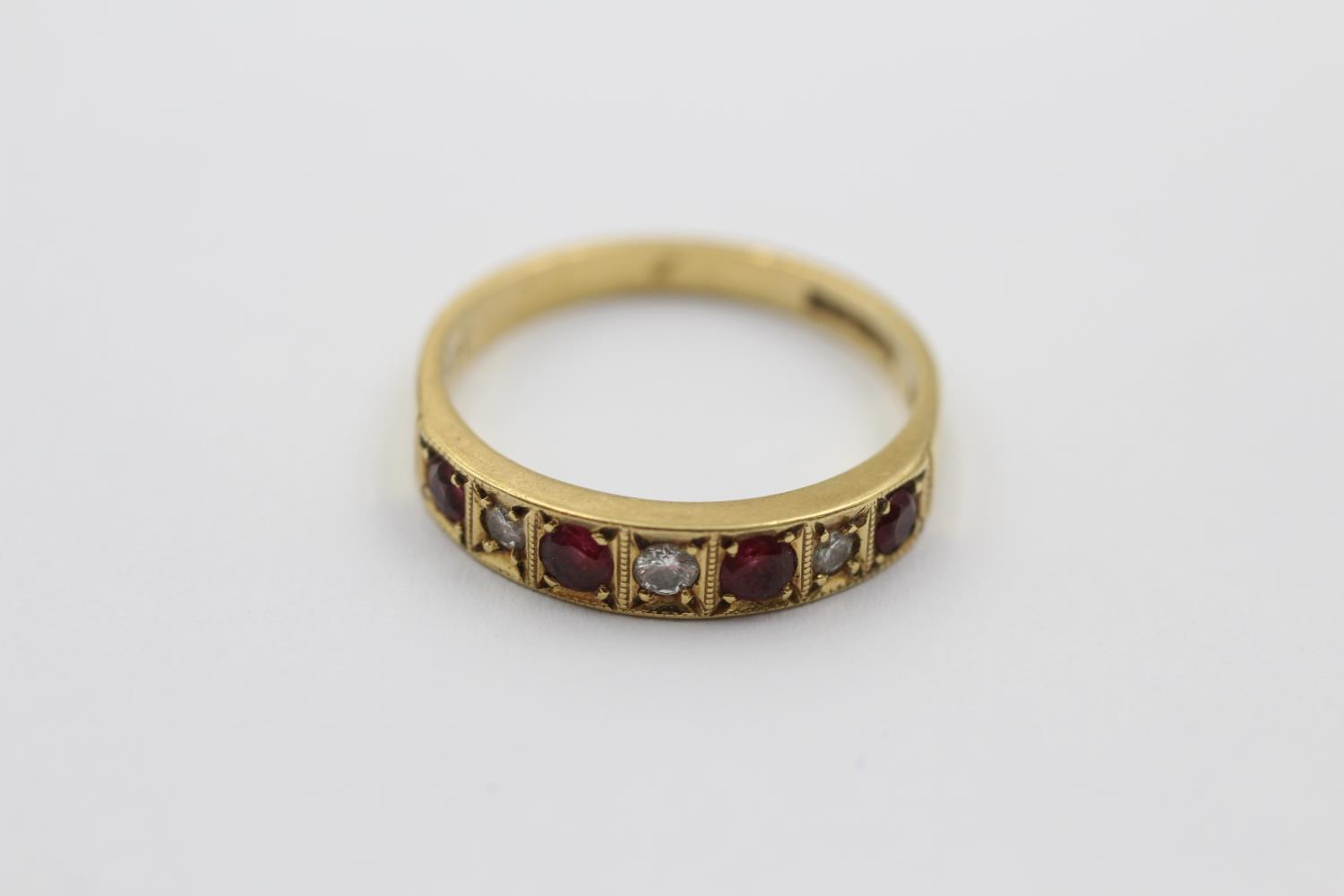 18ct gold ruby & diamond seven stone gypsy setting ring (3.4g) size O