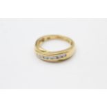 18ct gold diamond crossover channel setting ring (3.4g) Size K