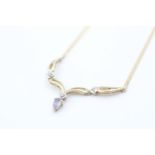 9ct gold diamond and tanzanite set static pendant necklace (3.3g)