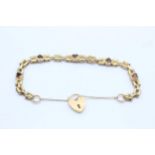 9ct gold heart-shaped garnet fancy link bracelet with heart padlock (14.5g)