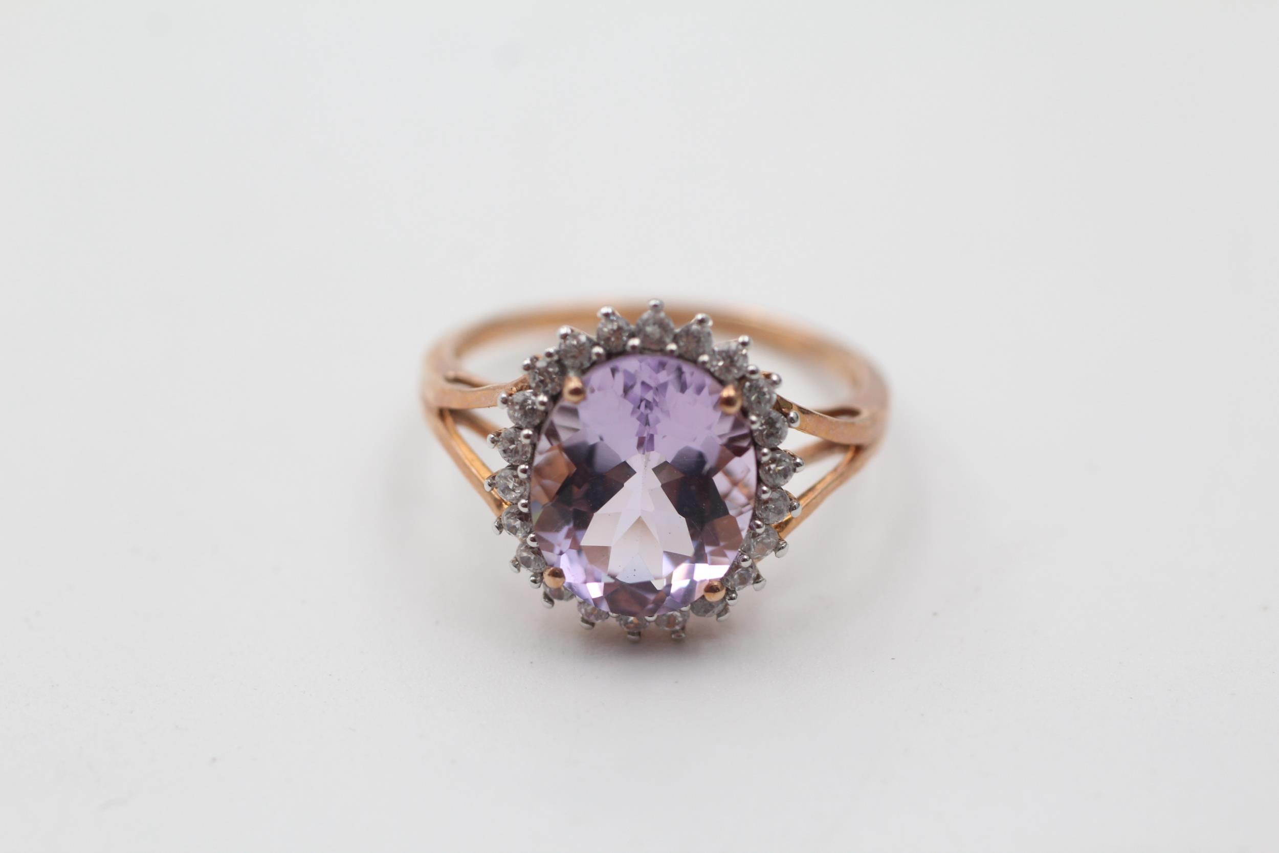 9ct gold amethyst and clear gemstone halo set dress ring (2.7g) size O