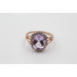 9ct gold amethyst and clear gemstone halo set dress ring (2.7g) size O
