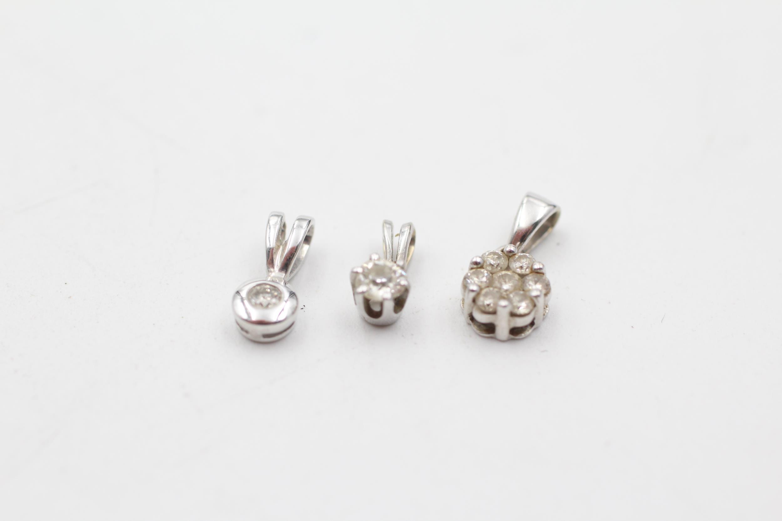 3 x 9ct white gold diamond set pendants inc. cluster & solitaire (1.3g)