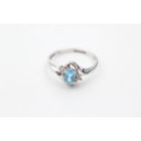 9ct white gold diamond and topaz twist ring (2.1g) Size P