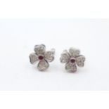 18ct white gold art deco paired diamond and ruby floral screw back earrings (5.4g)