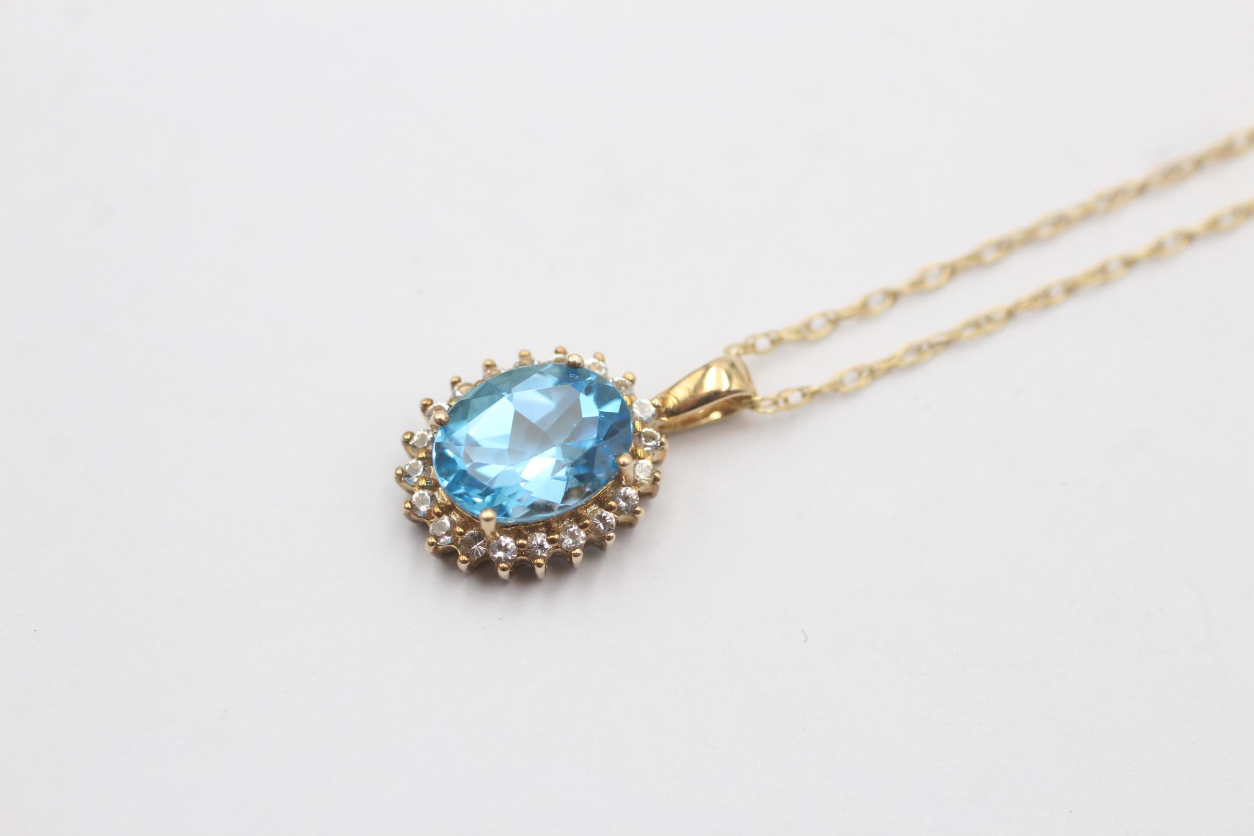 9ct Gold Topaz And White Gemstone Halo Pendant On Chain (2.4g)