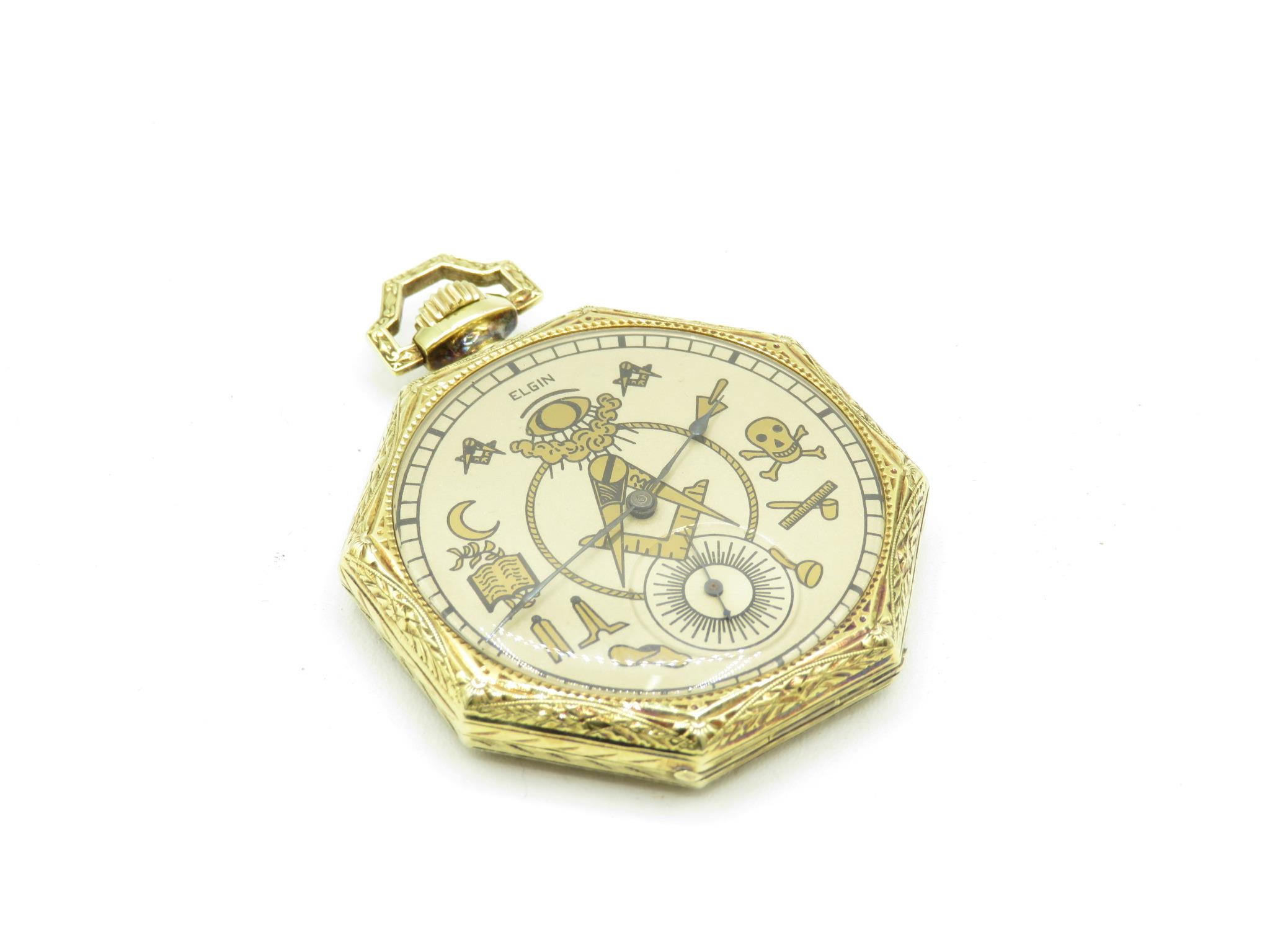 14ct gold Elgin Masonic pocket watch 43mm case with Masonic symbols on dial, movement marked Elgin