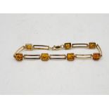 9ct gold baltic amber set station bracelet (6.4g)