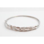 9ct white gold vintage diamond set woven plat bangle (9.9g)