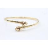 14ct gold vintage leopard head final bypass bangle by faro (10g)
