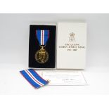 Boxed ERII Queens Golden Jubilee medal and certificate