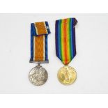 WWI Medal Pair and original long ribbon named 145571 Gnr. J. Jolly RA
