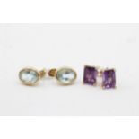 2 x 9ct gold paired gemstone stud earrings inc. amethyst & topaz (2g)