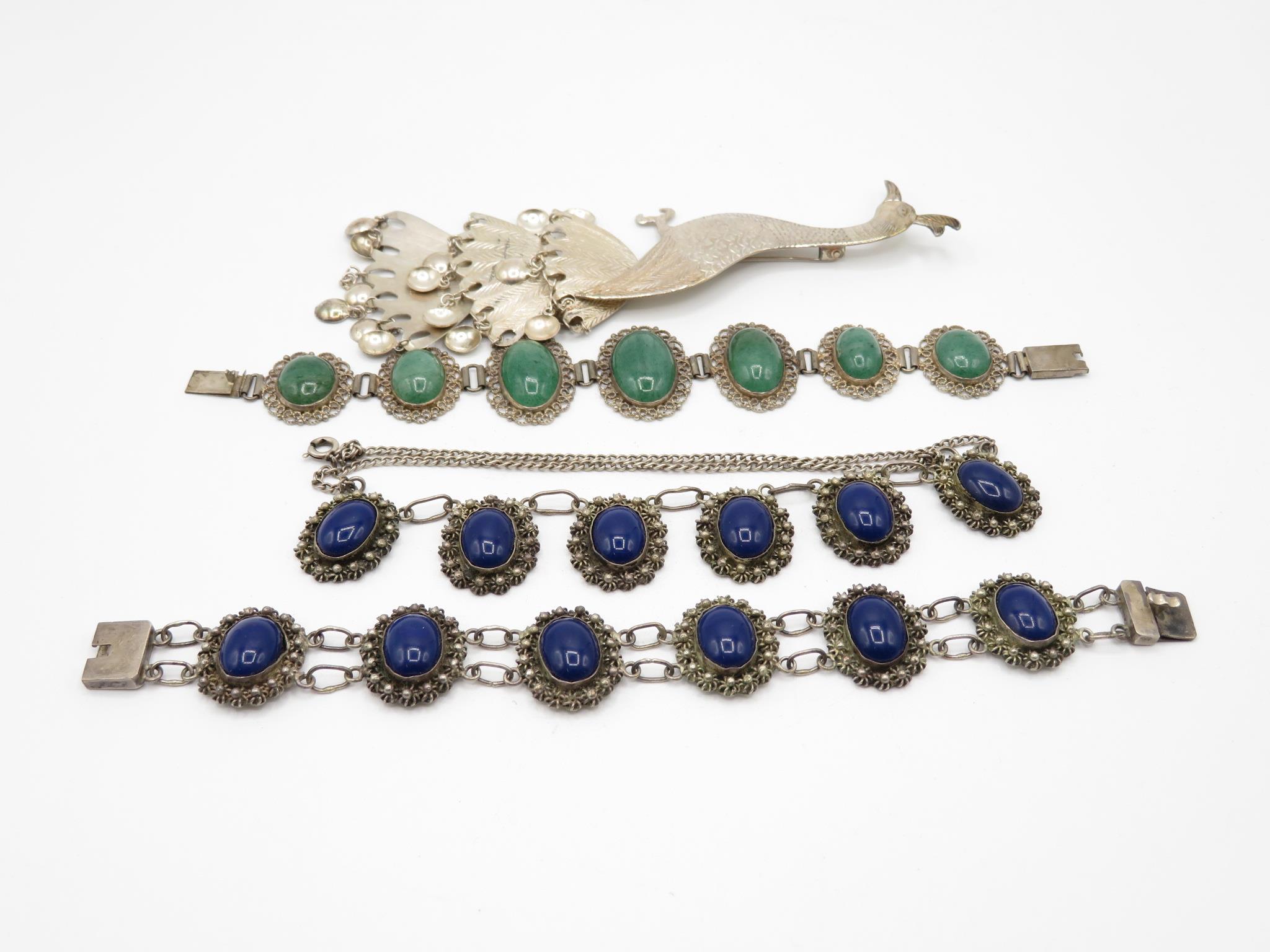 A Silver Filigree Gemstone Set Necklace And Bracelet, And A Silver Peacock Brooch (89g)