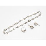 A Silver Moonstone Necklace, Ring And Earrings (38g)