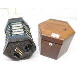 A lachenal and co London 48 button concertina in original mahogony case