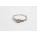 18ct white gold round brilliant cut single stone ring with diamond set shank (2.2g) Size O