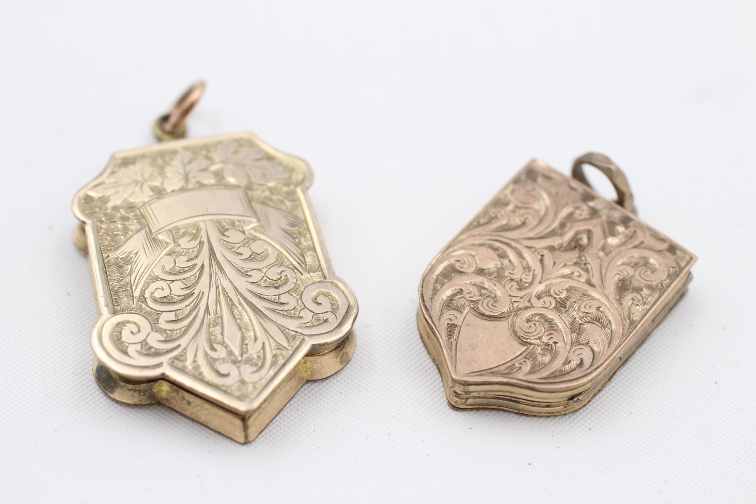 2 x 9ct back & front gold antique foliate shield crest lockets (16.4g)