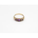 9ct Gold Amethyst Three Stone Ring With Scrolling Frame (2.9g) Size M.5