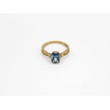 9ct Gold Blue Topaz Single Stone Ring With Diamond Sides (2.1g) Size P