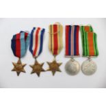 Boxed WWII medal group including Africa, France and Germany stars etc. //