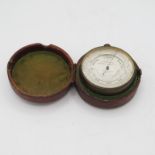 Leather cased pocket barometer with intact mercury insert by CW Dixey Optician to The Queen