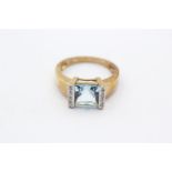 9ct Gold Blue Topaz Single Stone Ring With Diamond Sides (3.8g) Size O 1/2