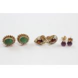 3 X 9ct Gold Emerald, Amethyst And Garnet Set Stud Earrings (2.5g)