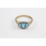 9ct Gold Blue Topaz & Diamond Three Stone Halo Dress Ring (2.3g) Size P