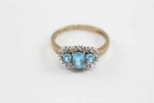 9ct Gold Blue Topaz & Diamond Three Stone Halo Dress Ring (2.3g) Size P