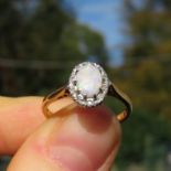 18ct Gold White Opal & White Gemstone Oval Halo Ring (2.7g) Size N