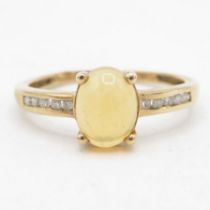 9ct gold opal single stone ring with diamond set shoulders (1.7g) Size N 1/2