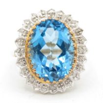 9ct gold blue topaz single stone cocktail ring with diamond frame (5.3g) Size P