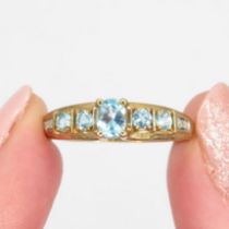 9ct gold blue gem & diamond eternity ring (2.4g) Size Q