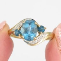 9ct gold blue topaz & diamond dress ring (2.1g) Size O