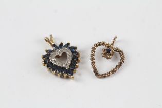 2 x 9ct gold vintage sapphire and diamond set heart shaped pendants (3g)