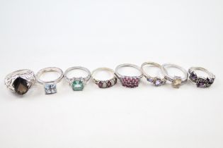 A collection of silver gemstone rings including Tanzanite (32g)