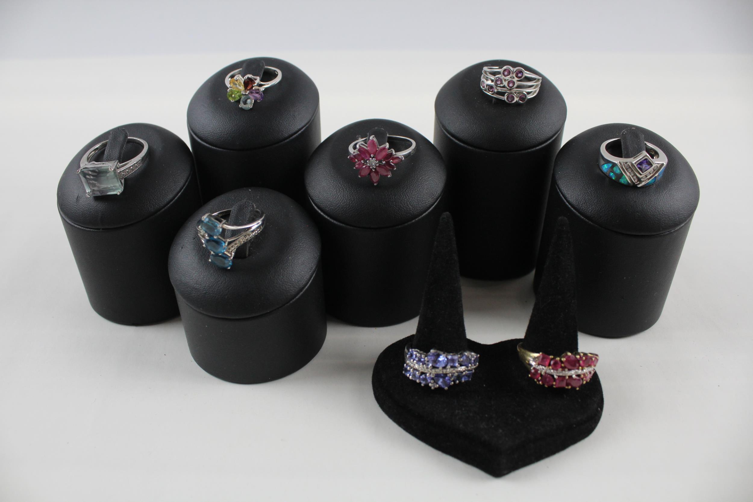 A collection of silver gemstone rings including Fluorite (34g)