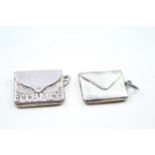 Two silver stamp holder pendants (16g)
