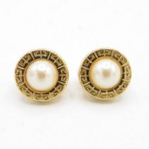 A pair of gold tone clip on earrings by designer Givenchy (7g)