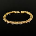 Bracelet, 585/14K yellow gold (hallmarked), 16,17g, flexible band made of different ring-shaped ele