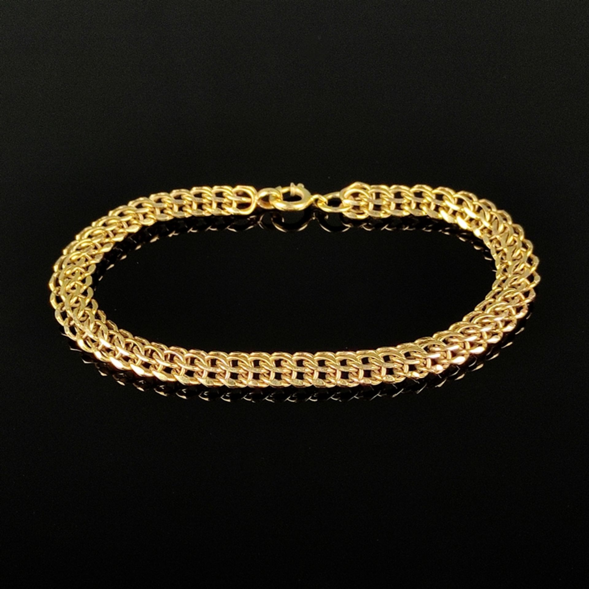 Bracelet, 585/14K yellow gold (hallmarked), 16,17g, flexible band made of different ring-shaped ele