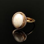Opal ring, 750/18K yellow gold (hallmarked), 4,1g, white opal cabochon with beautiful play of color