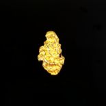 Pendant shaped as a nugget, 750/18K yellow gold (tested and hallmarked), 5g, pendant length 2.1cm